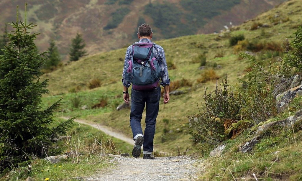 a man walking on a path