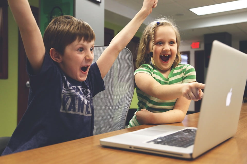 a group of kids laughing