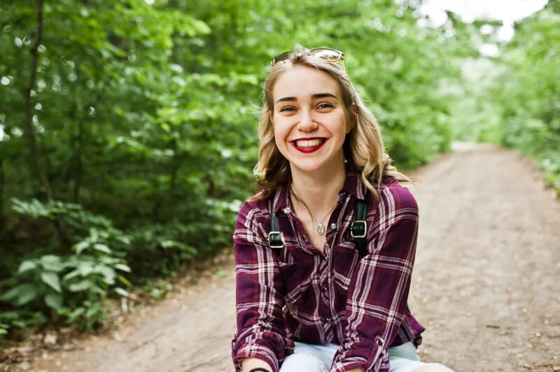 a person smiling outside