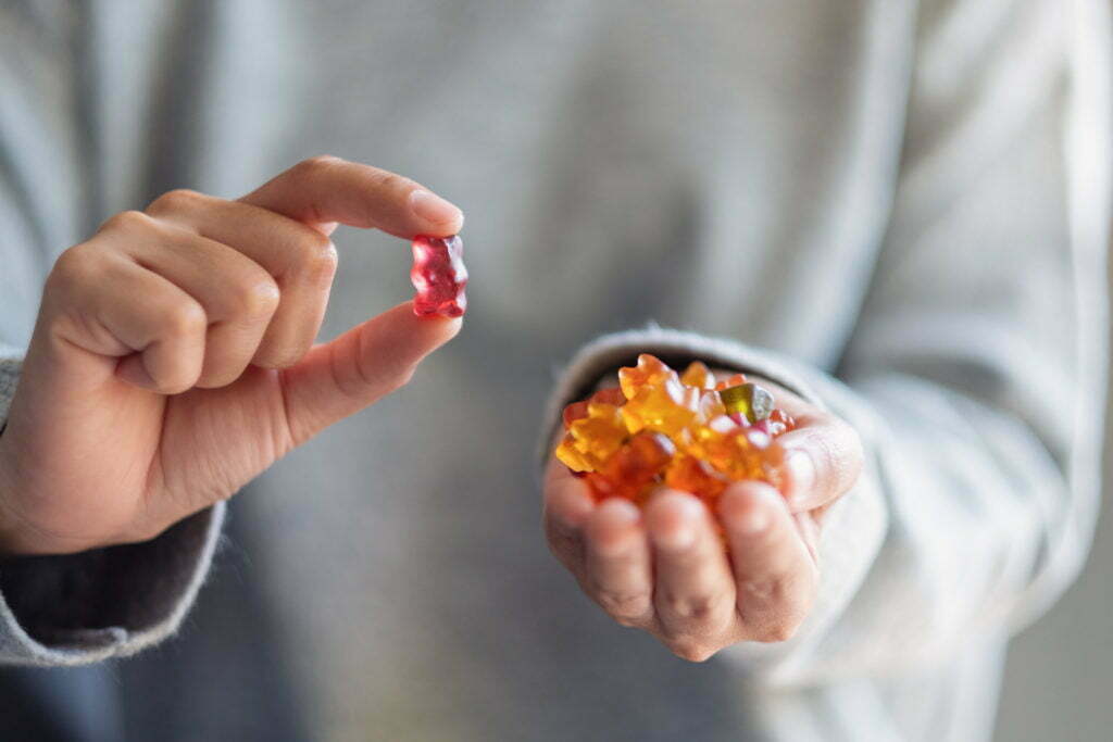 a person holding a small round object